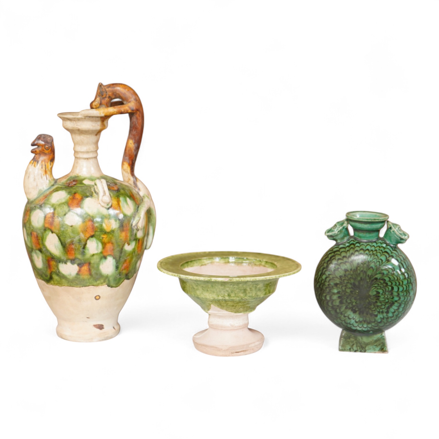 A Chinese agate ware flask, a sancai ewer and a stem dish, largest 26cm high